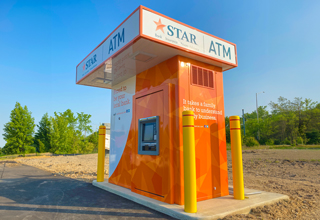 An image of an ATM on the street.
